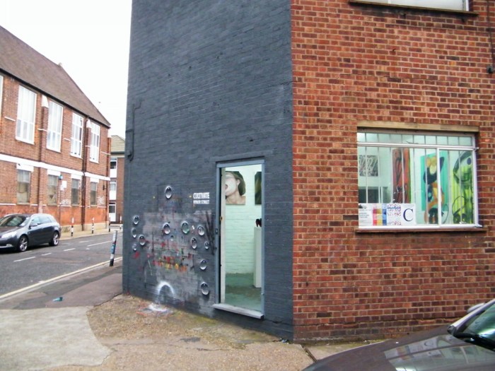 THE COLD LIGHT OF FRIDAY MORNING ON CULTIVATE CORNER