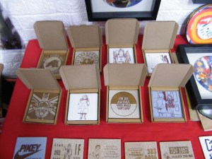 CARRIE REICHARDT TILES, £10 each at the ART IS FOR LIFE show