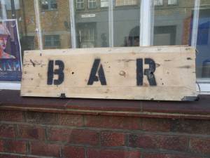 The untainted bar sign before it was painted on.